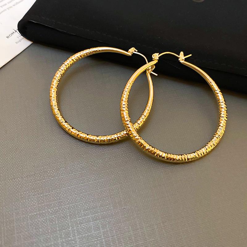 Silver Needle Style Circle Earrings - Simple Korean Metal Design, All-Match Earrings for a Celebrity Look.