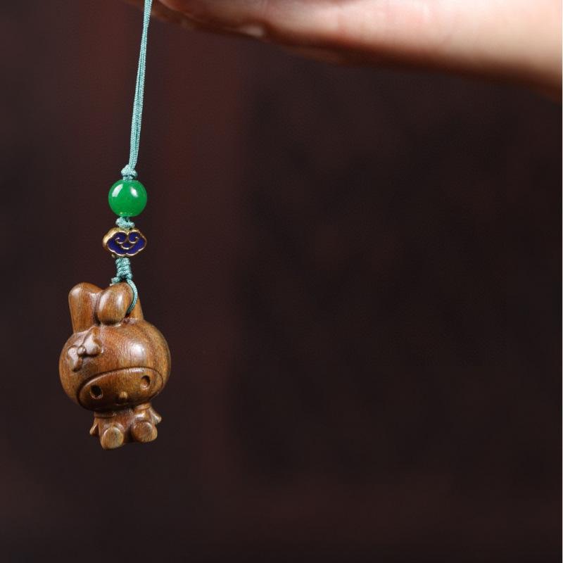 Twelve Zodiac Animal Charms Green Sandalwood Set: Rat, Ox, Tiger, Rabbit, Dragon, Snake, Horse, Sheep, Monkey, Rooster, Dog, Pig.