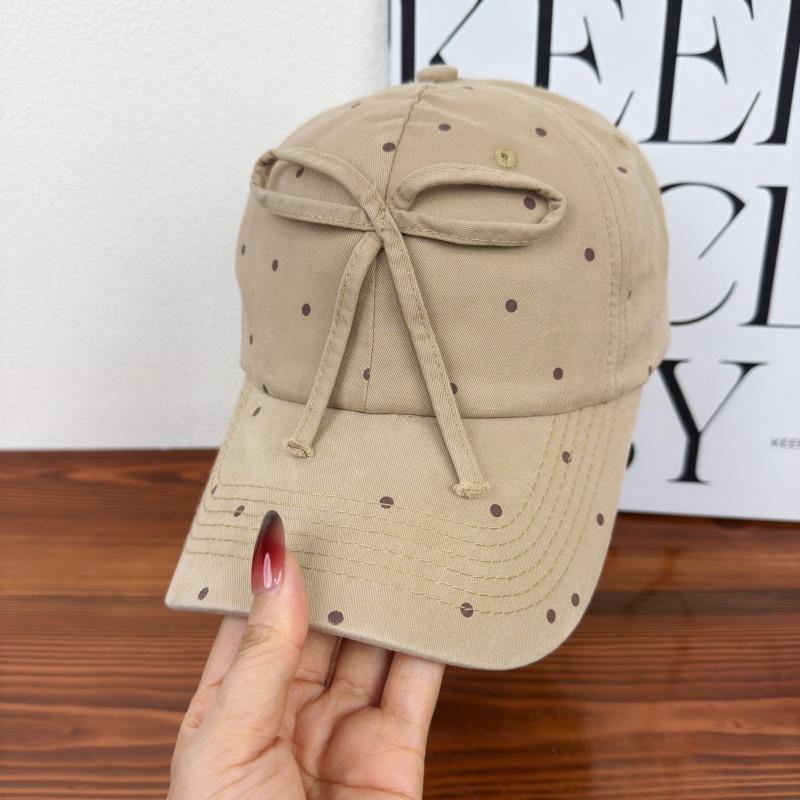 Korean black and white polka dot bow baseball cap female versatile sweet cute niche design show face small cap