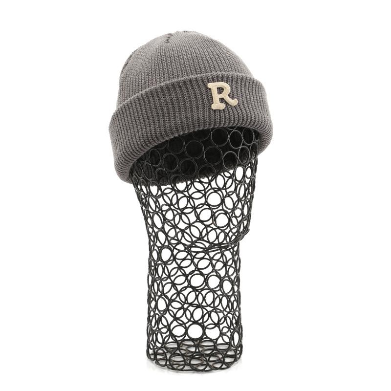 Women's Solid Color Letter Print R Rolled brim knitted hat for outdoor cycling, providing warmth, cold protection, and ear coverage