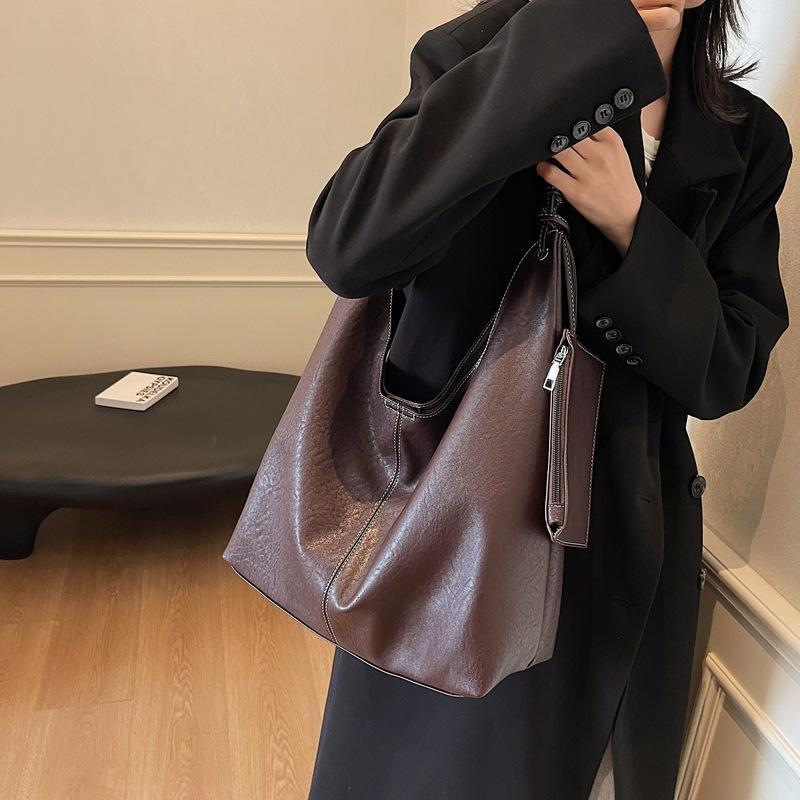 2025 новая высококачественная сумка-тоут на плечо из мягкой кожи, вместительная повседневная сумка-ведро, ленивая кроссбоди, для通勤, под мышку