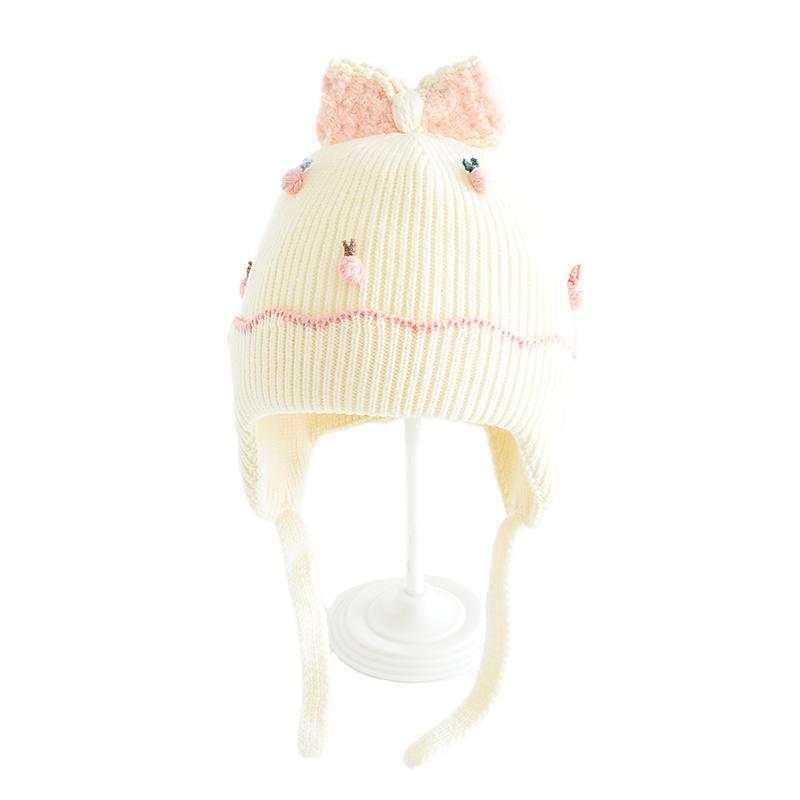 Winter children's hats, girls' outdoor sun shading and windproof woolen hats, baby knitted bow ear protection hats