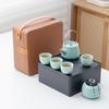 Portable Ceramic Kung Fu Tea Set: Teapot with Handle and Four Cups for Travel and Business Gifting