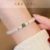 Hetian jade bracelet with round beads in white and light green, simple and elegant, a gift for women
