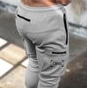 Мужские спортивные штаны Muscle Fitness с множеством карманов для тренировок на весну и осень