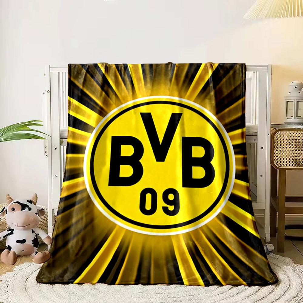 Yellow circular logo with "BVB 09" text, surrounded by radial light streaks. for all seasons blanket lunch break throw gift