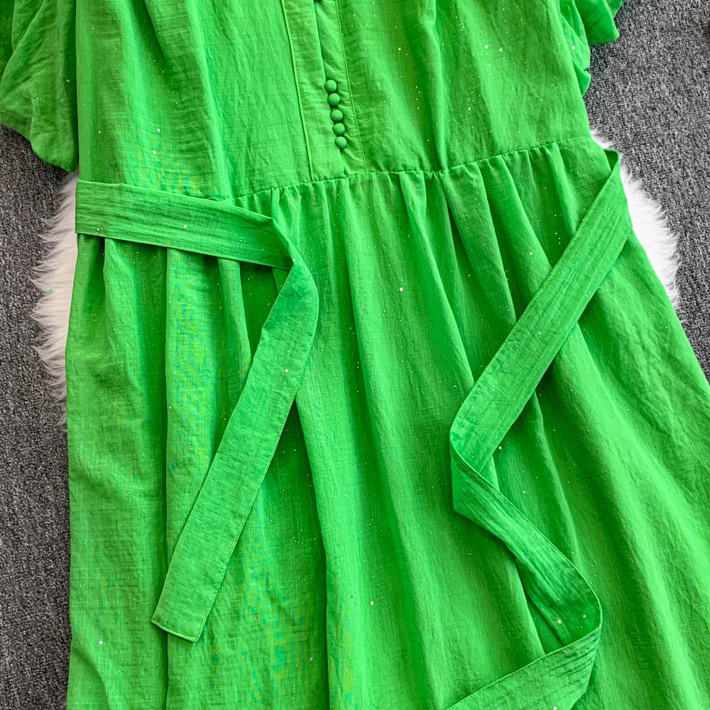 Женское длинное платье со стойкой воротником, рукавами-буфами, однобортное, макси, свободного кроя, с завязкой на талии, оборкой по краю, длинное платье