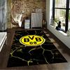 Современный черно-желтый ковер с логотипом футбольного клуба BVB 09. Подходит для использования в качестве противоскользящего покрытия для гостиной, спальни, диванов.