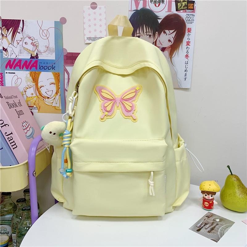 Spring and summer new student cute backpack women's fashion simple printing butterfly junior high school large-capacity schoolbag women