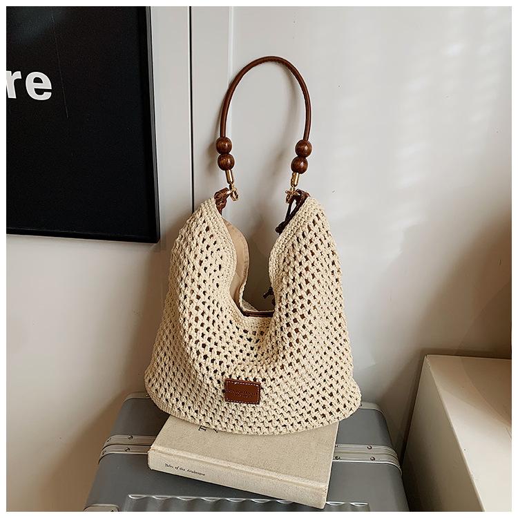 Праздничная плетеная сумка, женская летняя новая модная ажурная вязаная сумка через плечо, большая вместительная сумка для поездок на работу