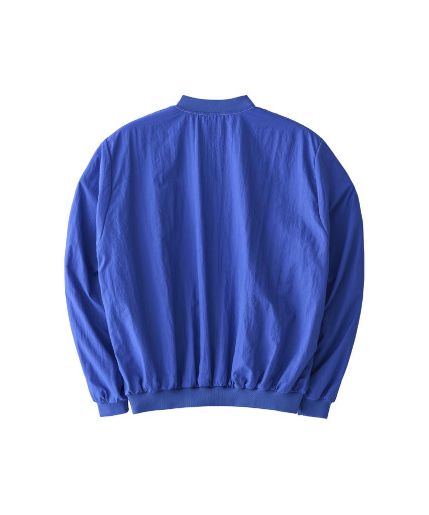 TUEWID V-Neck Wind Shell Pullover In Varsity Blue