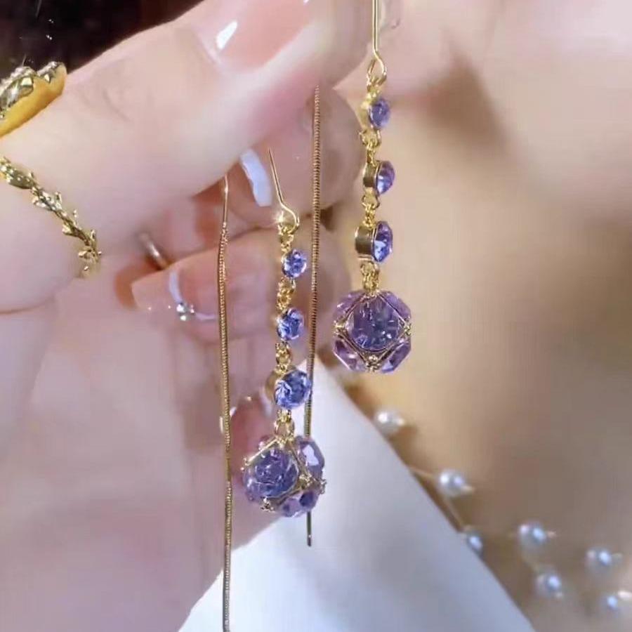 Серьги с кисточками из фиолетовых бриллиантов: Элегантный, универсальный и модный