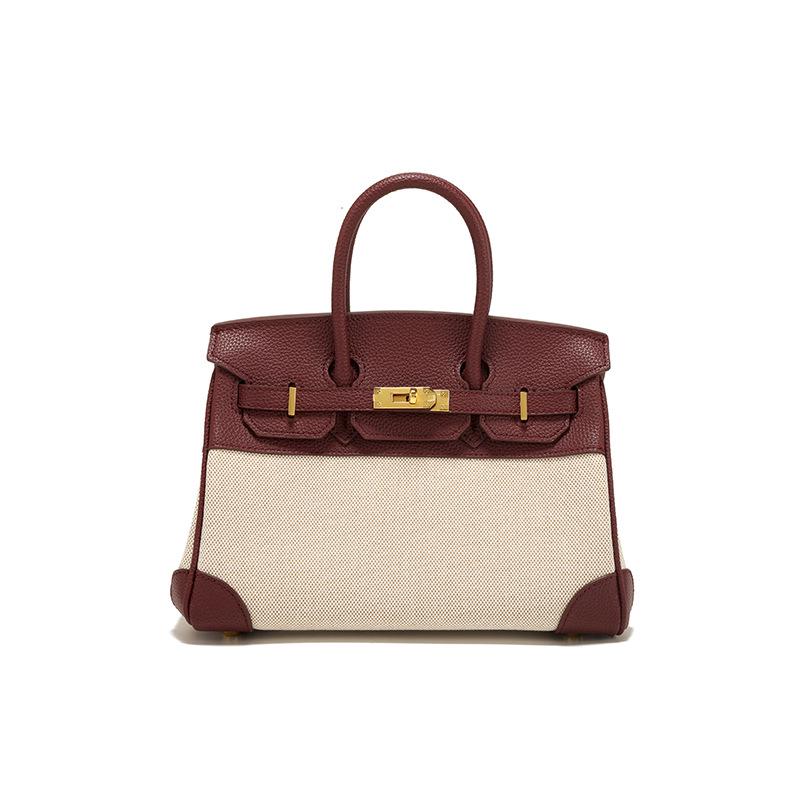 Весна 2025 г. Женская сумка через плечо из кожи и холста контрастного цвета