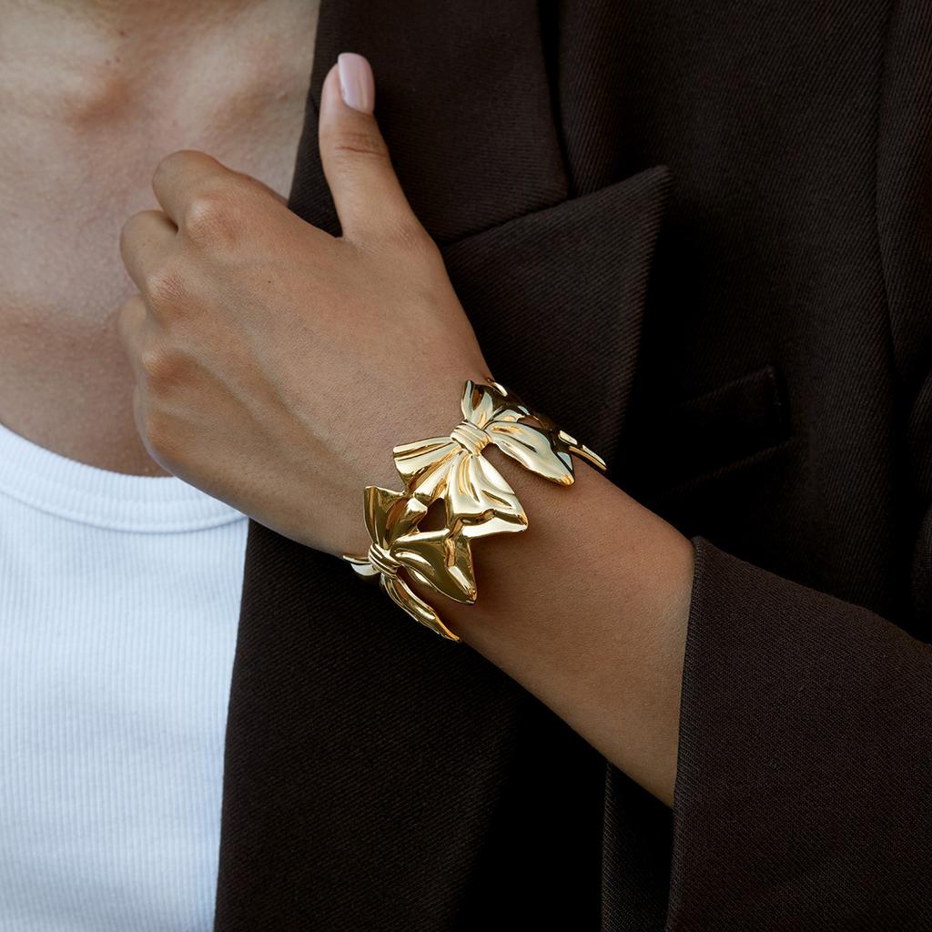 Сладкий и романтичный дизайн, ювелирное изделие - браслет-бант из золота 18 карат