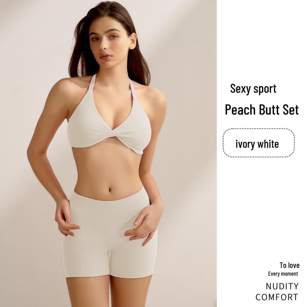 Женский персиковый комплект для йоги с эффектом подтяжки бедер: Спортивный комплект из двух частей: брюки три четверти с перекрестными лямками на спине.