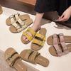 Slippers women's outer wear 2025 summer new fashion belt buckle seaside beach one-word flat-bottomed casual cool slippers