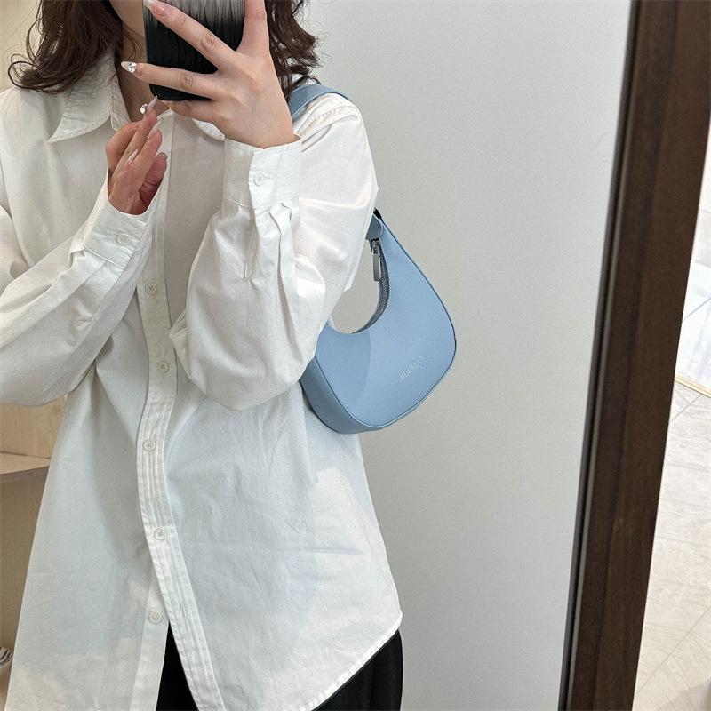 2024 Новая женская сумка для подмышек, женская сумка Niche Design, высококачественная однотонная сумка через плечо, женская мягкая сумка для покупок для девочек