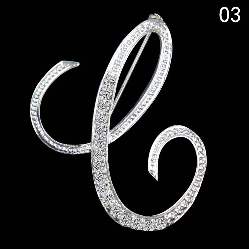 Элегантная брошь с английской буквой алфавита с горным хрусталем