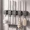Wall-Mounted Suction Cup Mop Holder Bathroom No-Drill Storage Rack Mops Brooms ABS Plastic Modern Minimalist Design