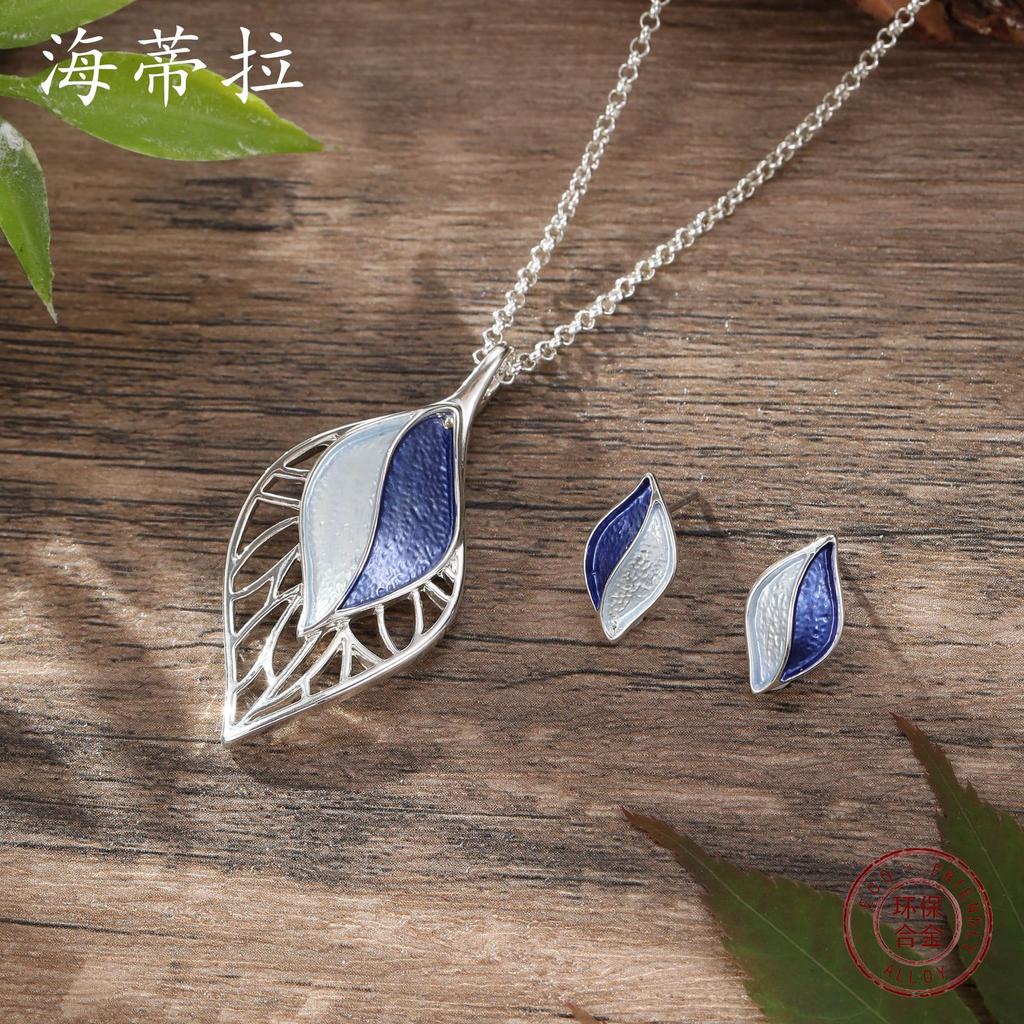 Luxury new color painting oil hollow leaf stud earrings pendant set, women's simple versatile leaf necklace