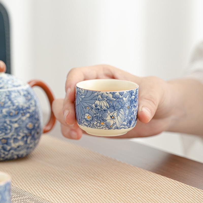 Flower travel tea set, light luxury and portable, one pot and four cups of Ru kiln car express cup, and business gifts