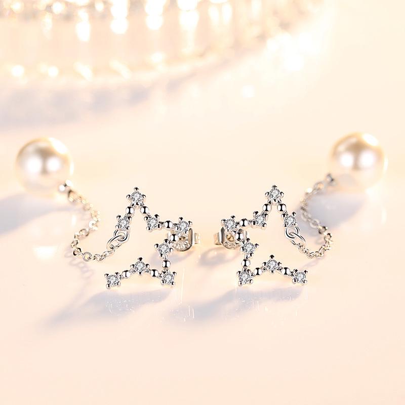 Серьги-гвоздики с кисточками в виде преувеличенных звезд, серьги-гвоздики, цирконовый метеорит, средняя и длинная жемчужина, простая индивидуальность, серьги-пентаграммы.