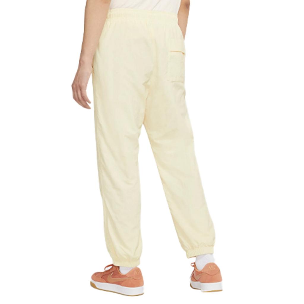 Nike Спортивные брюки мужские бежевые средние CW7716-113