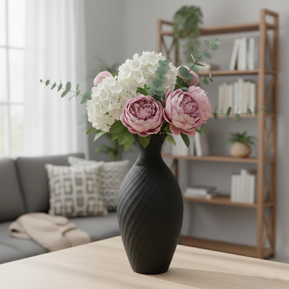 A decorative vase in the shape of a jug, black, for flowers, elegant design.