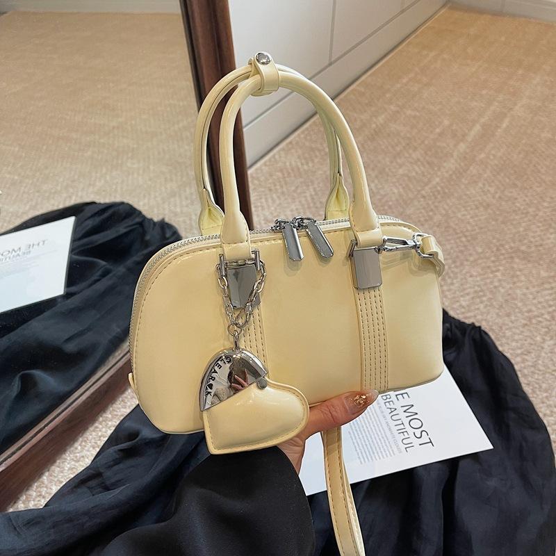 Корейская версия нишевый дизайн простой и универсальный портативный сумка-мессенджер для поездок на работу женская весна 2025 новая модная повседневная сумка-мессенджер