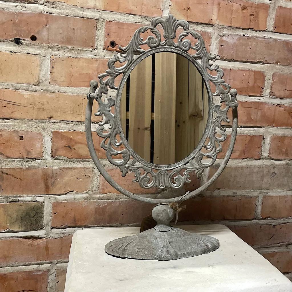 Standing dressing table mirror with carved frame
