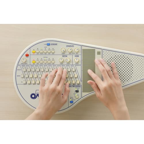 SUZUKI Omnichord OM-108, an Electronic Musical Instrument with 108 Chords