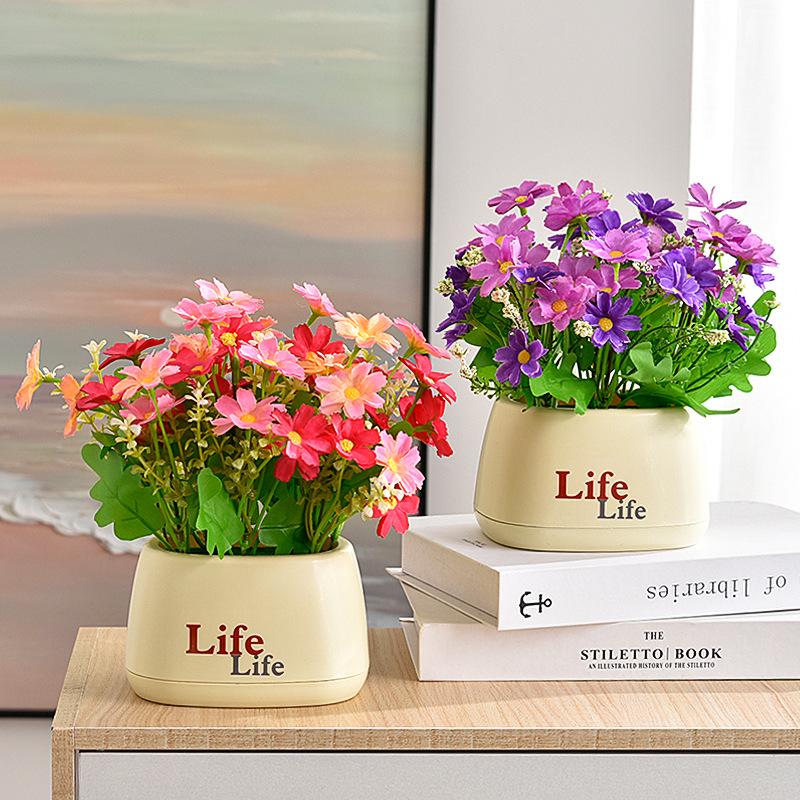 Living Room Decor: Artificial Sunflower and Green Plant Arrangements, Small Potted Plants, and Plastic Bouquets