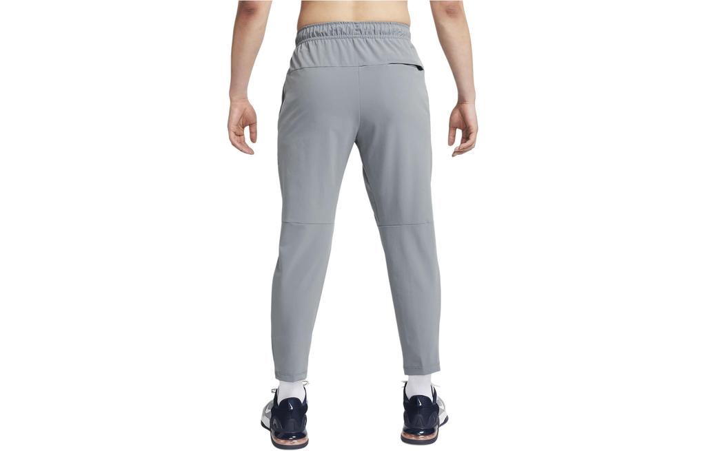 Nike Повседневные брюки Dri Fit Unlimited для мужчин, дымчато-серые FB7547-084