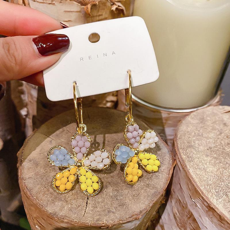 Colored rice beads five-petaled flower ear buckles small fresh and sweet versatile earrings 2025 early spring new atmosphere earrings