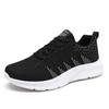 Popular Men's New Breathable Fly-woven Mesh Sports Shoes Soft Sole Light Running Casual Men's Shoes Tide