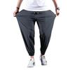 Мужские повседневные брюки большого размера из быстросохнущего шелка Ice Silk — летние легкие, свободные, с девятью точками посадки, высокоэластичные спортивные брюки.