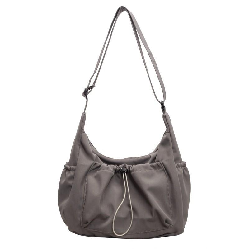 Canvas Ladies Crossbody Bag With Solid Color Drawstring Design For Daily Use And Urban Style