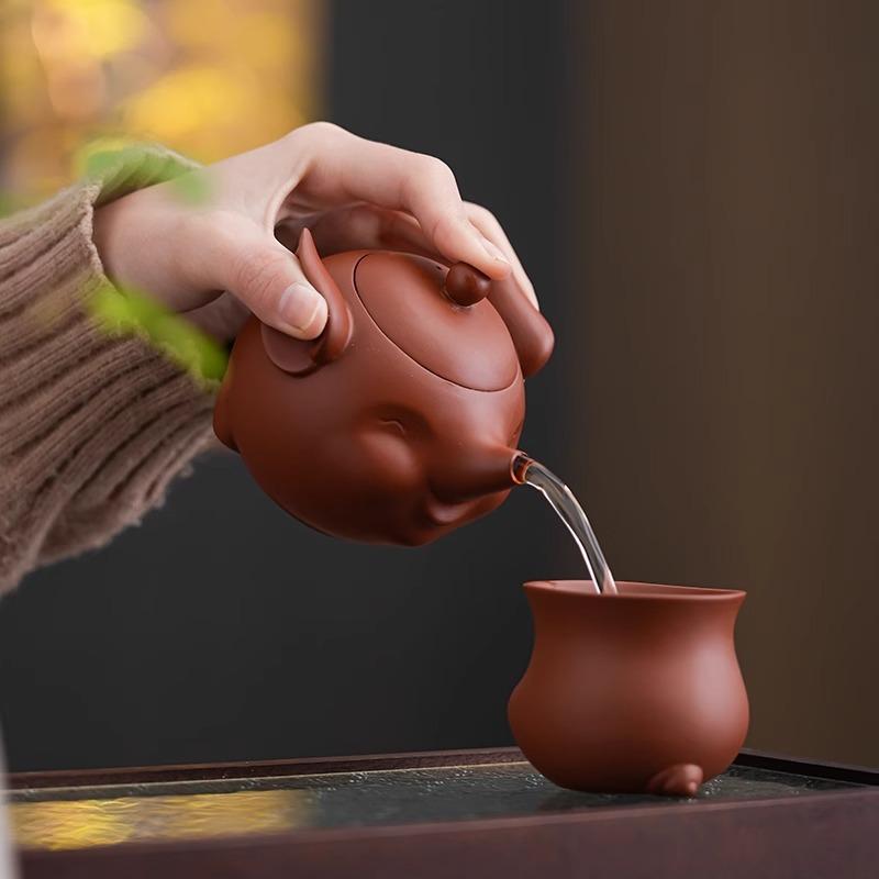 Purple pottery little flying pig teapot retro creative household ceramic tea hand grab pot kung fu travel tea set can be printed
