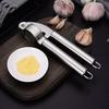 Stainless Steel Manual Garlic Press & Peeler: Mincer, Masher, Squeezer for Kitchen Use