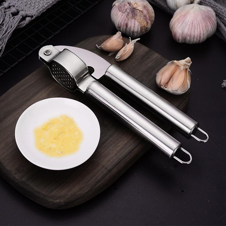 Stainless Steel Manual Garlic Press & Peeler: Mincer, Masher, Squeezer for Kitchen Use
