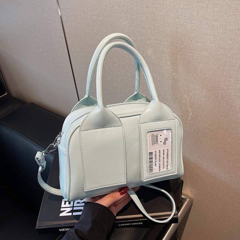 В этом году популярны сумки-бостон для женщин, новые универсальные сумки-мессенджеры для весны и лета 2025, простые женские портативные сумки-подушки.