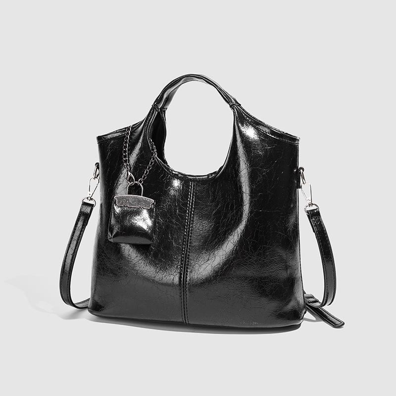 Модная женская текстурированная черная сумка-тоут - 2025 Большая вместительная универсальная сумка на плечо и через плечо