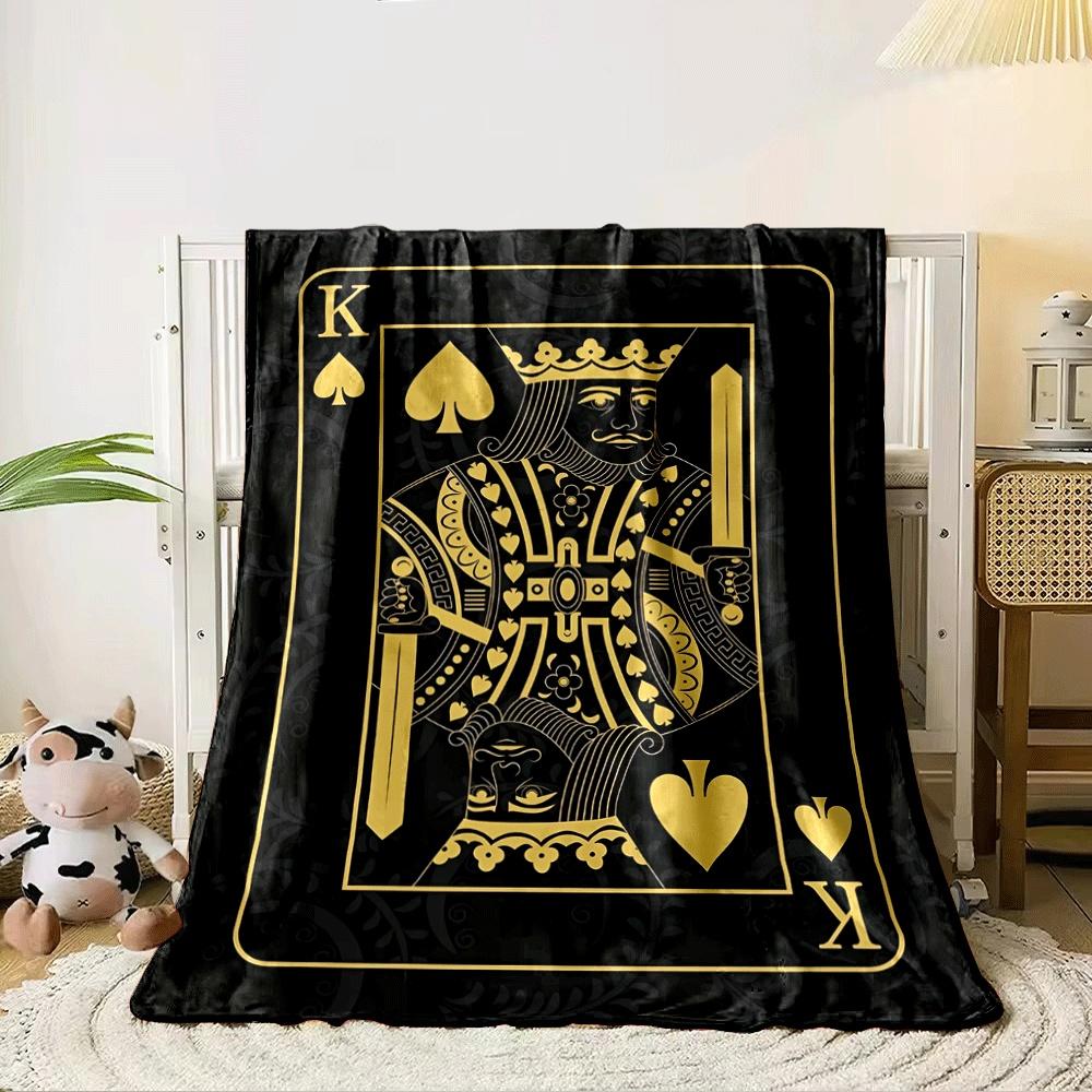A golden King of Spades card design on a dark ornate background. for all seasons blanket lunch break throw gift