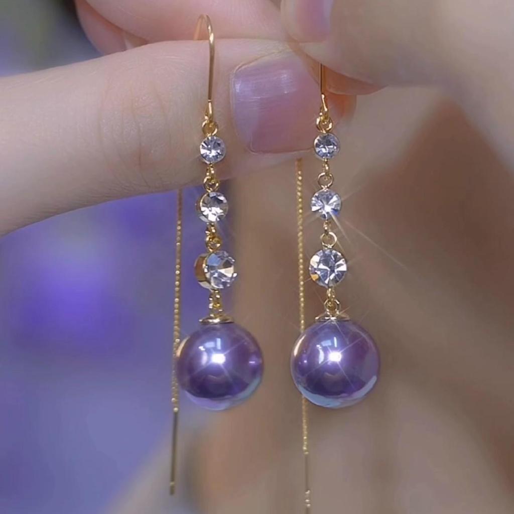 Cat's Eye Tassel Ear Chain 2024 Trend: Elegant Long Earrings with Light Luxury Design