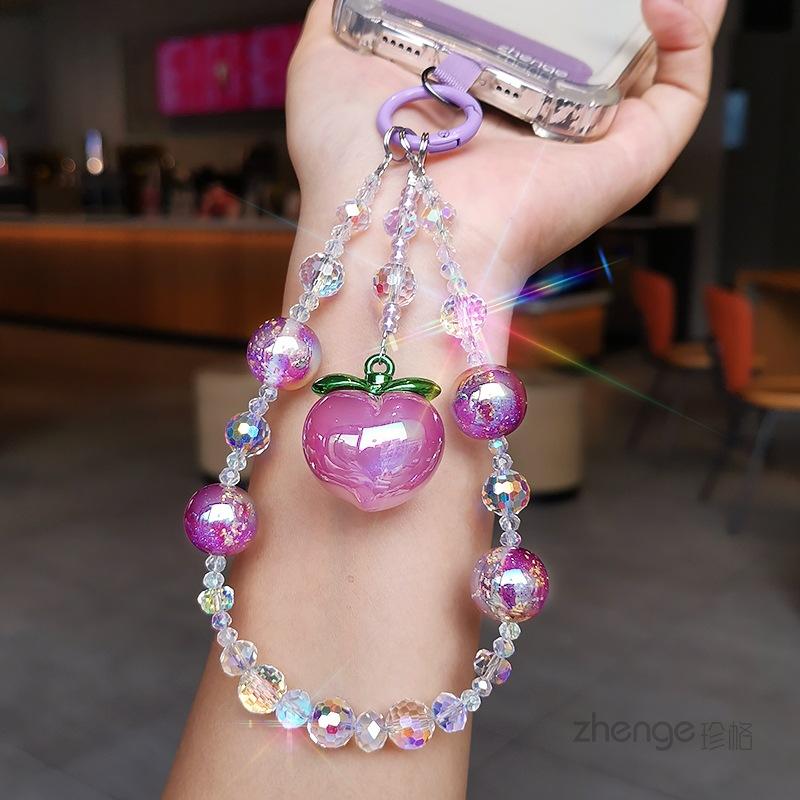 Purple peach pendant, crystal mobile phone lanyard ins women's bracelet, premium wrist pendant, beaded chain short.