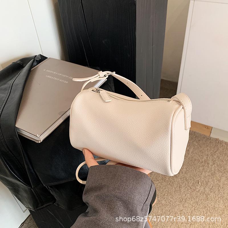 Korean Version Wide Shoulder Strap Cylinder Bag Women's 2025 Spring New Niche Pillow Bag Fashionable Versatile Single Shoulder Messenger Bag