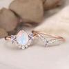 New European and American rose gold pair of rings with water drop opal stones Bow-shaped couple rings for women