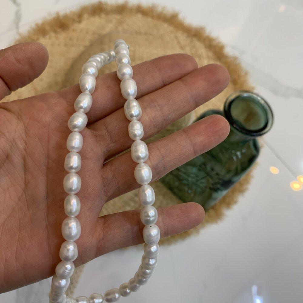 Cshopintheroom / Rice-pul-tegi Pure Silver Freshwater Pearl Necklace One Color