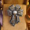 Vintage Faux Pearl Bow Brooch Sweater Cardigan Coat Business Suit Bowknot Lapel Pin Women Fashion Jewelry Clothing Accessories