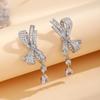 2025 Light Luxury High-end Full Diamond Bow Water Drop Earrings Ins Temperament Versatile Internet Celebrity Personalized Earrings Earrings